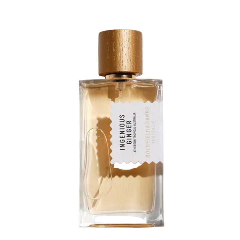Perfume bottle labeled 'Ingenious Ginger' with a gold cap on a white background